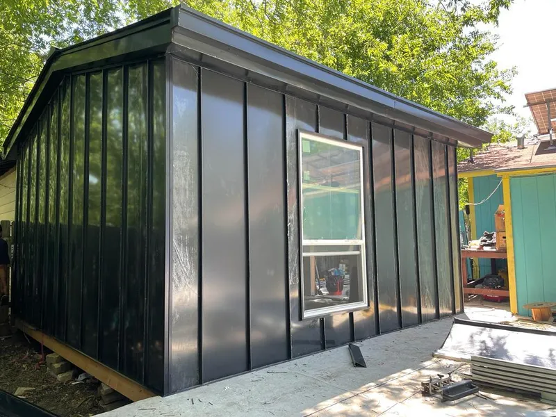 Black standing seam metal wall panels for Roof Inspection in Fallbrook