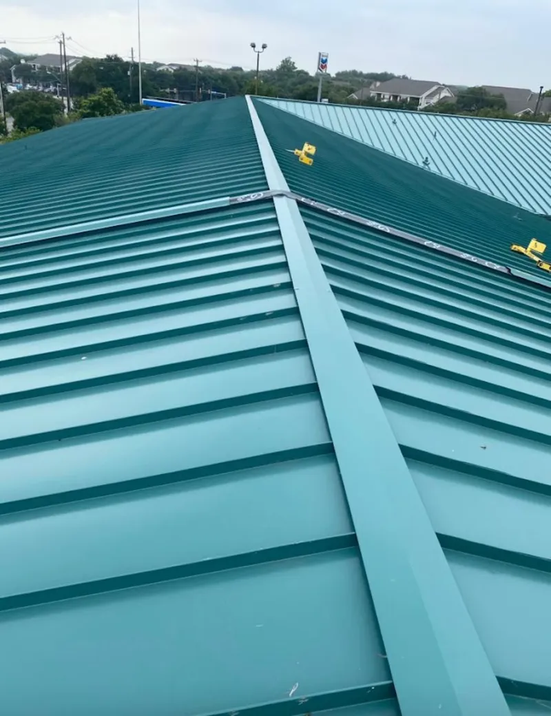Green commercial metal roof ridge and valley for Metal Roof Repair in Fallbrook